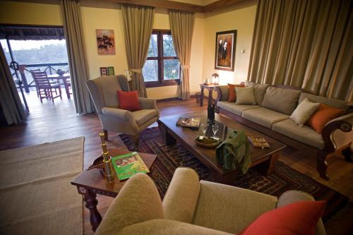 
A seating area at Neptune Ngorongoro Luxury Lodge - All Inclusive

