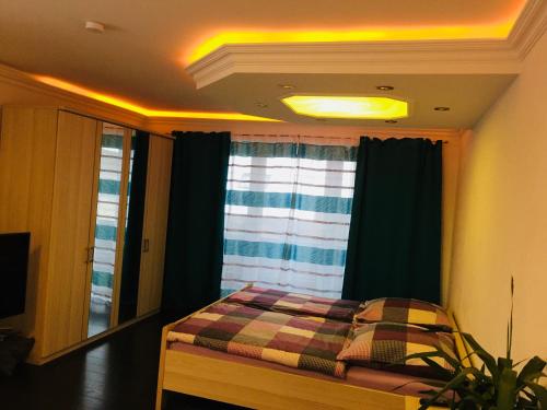 Katil atau katil-katil dalam bilik di Ferienwohnung Dhillon