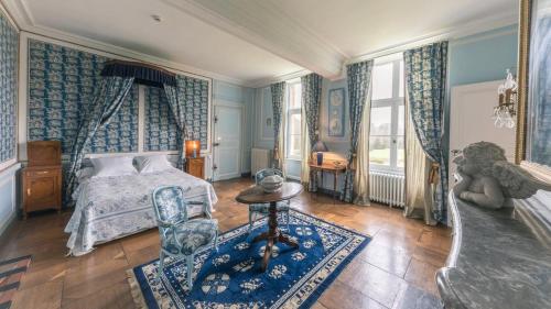 Katil atau katil-katil dalam bilik di Château de Vitry-la-Ville
