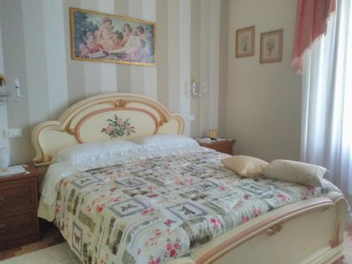 Postel nebo postele na pokoji v ubytování La Casa Di Torre Di Palme