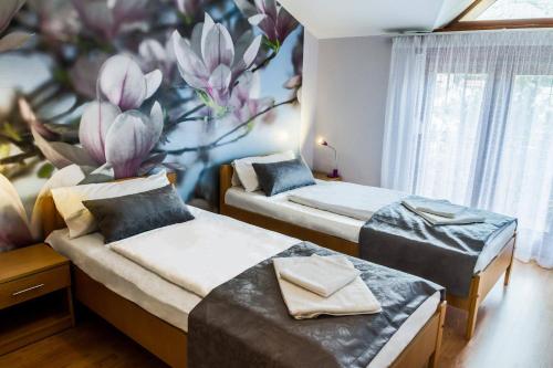 Llit o llits en una habitació de Villa Lipa