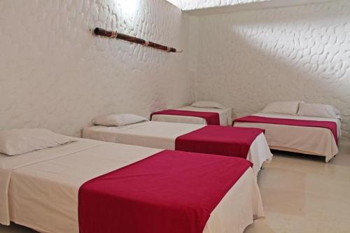 Ένα ή περισσότερα κρεβάτια σε δωμάτιο στο Hotel Boutique Yararaka