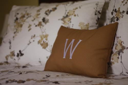 Ένα ή περισσότερα κρεβάτια σε δωμάτιο στο The Wilmington Inn