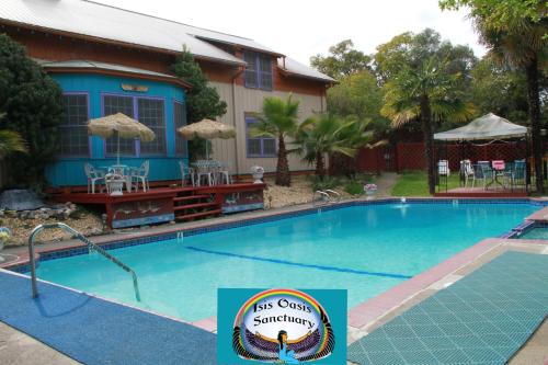 a swimming pool in front of a house at Gingerbread House in Geyserville