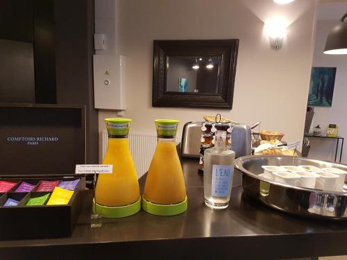 Kuchyň nebo kuchyňský kout v ubytování LOGIS HOTEL - Le Petit Bellon