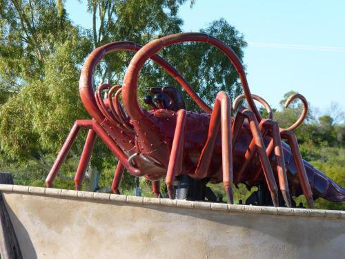 a childrens play equipment on top of a playground at Leander Reef Holiday Park in Port Denison