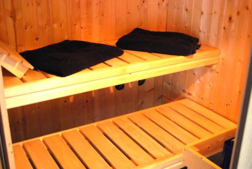 Katil dua tingkat atau katil-katil dua tingkat dalam bilik di Apartment Unna-Massen mit eigener Sauna