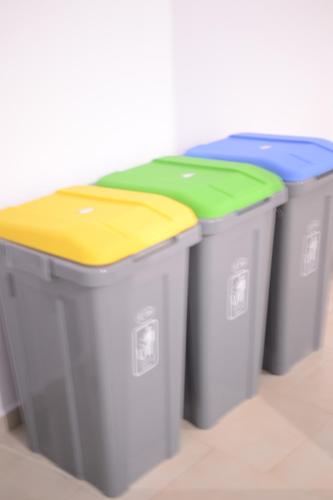 three trash cans with different colored tops at Green Point Home Chios in Vrontados