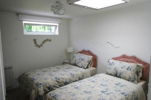 Postel nebo postele na pokoji v ubytování Gite at 105