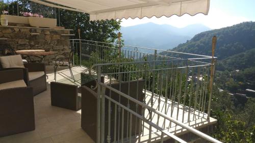 a balcony with a view of the mountains at Casa Ofelia in Levanto