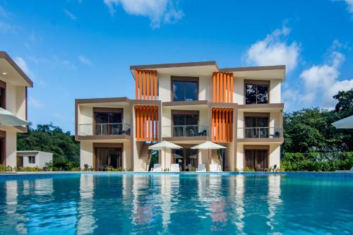 a view of a resort with a swimming pool at Caribbean Diamond Boutique Hotel in Sosúa