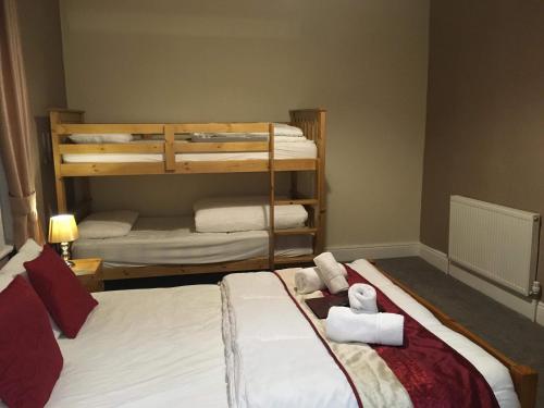 Postel nebo postele na pokoji v ubytování Hilbre Hotel