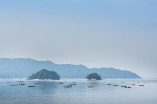 a large body of water with islands in it at Hotel Business Inn Yamada in Funakoshi