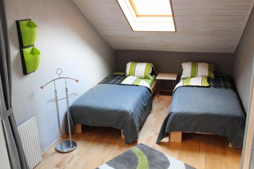 Katil atau katil-katil dalam bilik di Haus Basilea