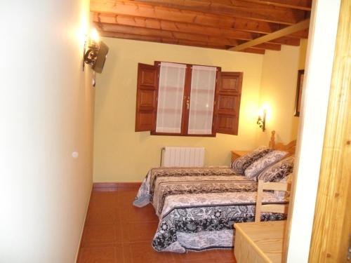 En eller flere senger på et rom på Casa Villaverde
