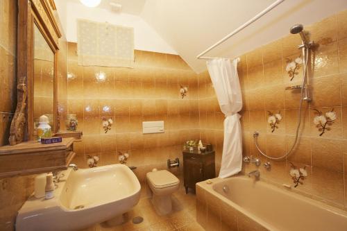 Ванная комната в Casa Laura