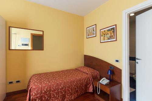 Lova arba lovos apgyvendinimo įstaigoje Hotel La Cascata