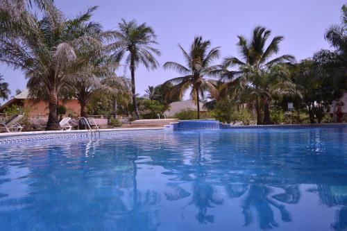 Bazen u ili blizu objekta Les Maisons De Marco SENEGAL - B&B