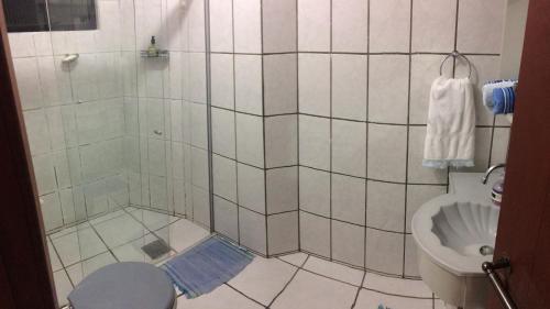 Koupelna v ubytování Condomínio Solar dos Reis