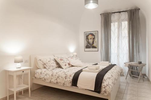 Posteľ alebo postele v izbe v ubytovaní Ricciarelli Home