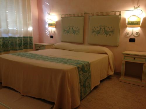 Lova arba lovos apgyvendinimo įstaigoje Hotel Monreale