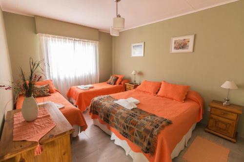 Ένα ή περισσότερα κρεβάτια σε δωμάτιο στο Hosteria La casa de Ketty
