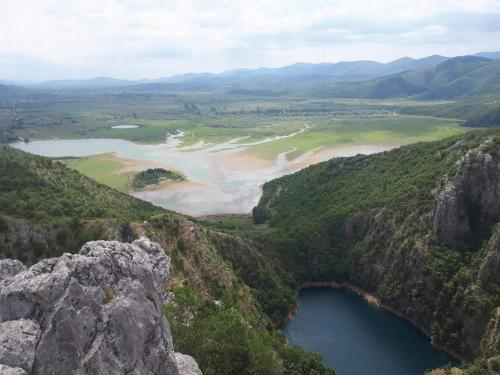 an aerial view of a river in a valley at Apartman Studio Zdravko Eco Village in Imotski
