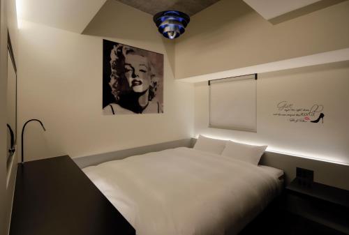 Cama o camas de una habitación en Third Place Hotel