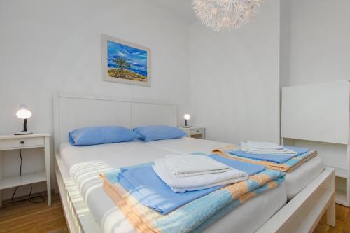 Krevet ili kreveti u jedinici u objektu Apartments Villa Tribunj