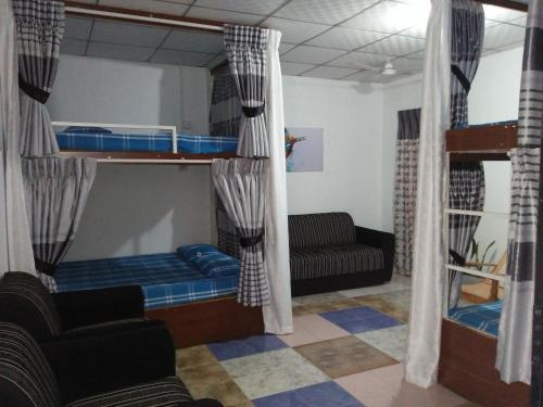 Posezení v ubytování Kingfisher Hostel