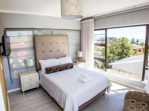 Katil atau katil-katil dalam bilik di Mulenvo Guest House