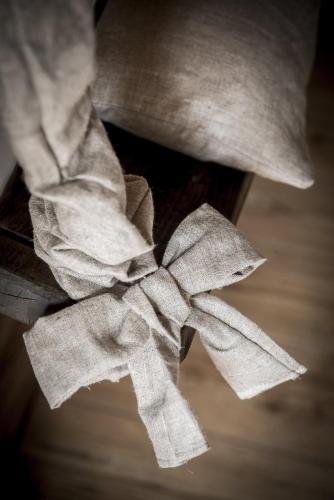 a person with a bow on a piece of paper at Berry House in Vigolo Vattaro