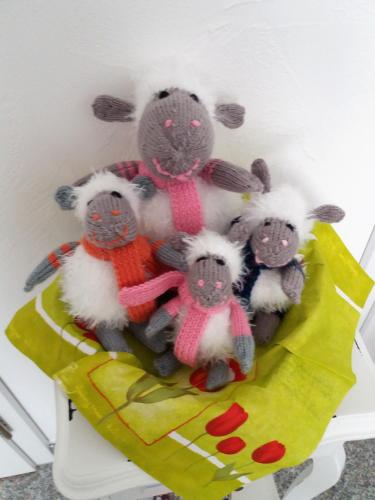 a group of stuffed animals sitting on a chair at Gästehaus Am Hochsimmer in Ettringen