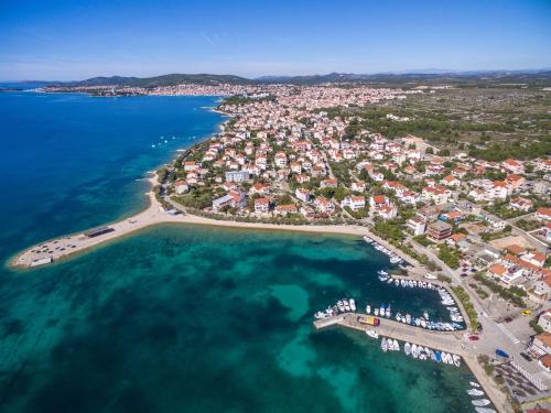 an aerial view of a small island in the water at Apartments Anita in Srima