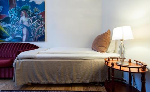 Katil atau katil-katil dalam bilik di Frimurarehotellet; Sure Hotel Collection by Best Western