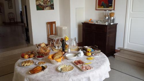 a table with a bunch of food on it at Casina Romita in Lequile