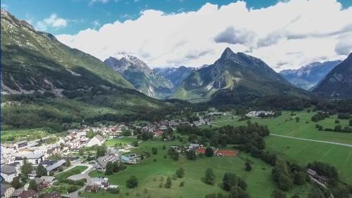 an aerial view of a village in the mountains at Apartment ALBA in Bovec