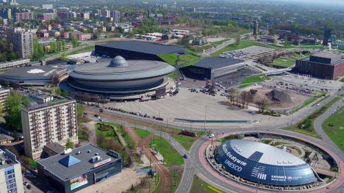 an aerial view of a large building in a city at Hotel Diament Spodek in Katowice