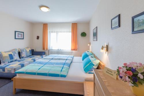 Katil atau katil-katil dalam bilik di BodenSEE Apartment Ravensburg Grünkraut