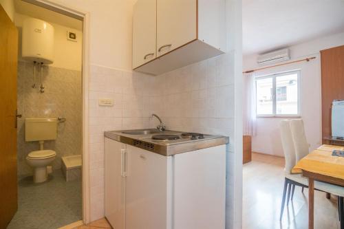 Ένα μπάνιο στο Apartments Zeljko