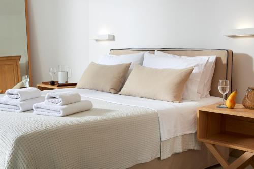 Ένα ή περισσότερα κρεβάτια σε δωμάτιο στο Pagona Studios