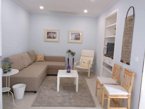 Χώρος καθιστικού στο Long Beach Apartamento AL