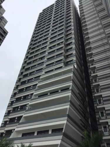 a tall building with balconies on the side of it at Meridin Medini Muslim Condo in Nusajaya