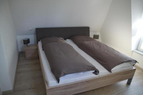 Postel nebo postele na pokoji v ubytování Ferienwohnung am Elbdeich