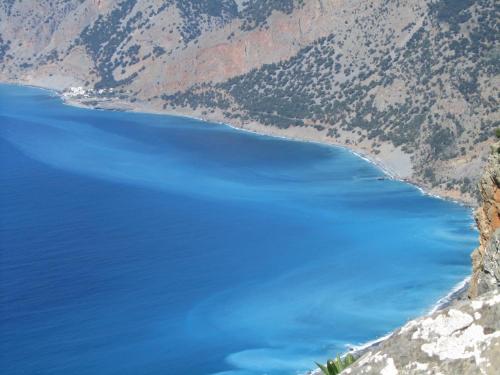 a view of a blue lake in the mountains at Faragi in Agia Roumeli