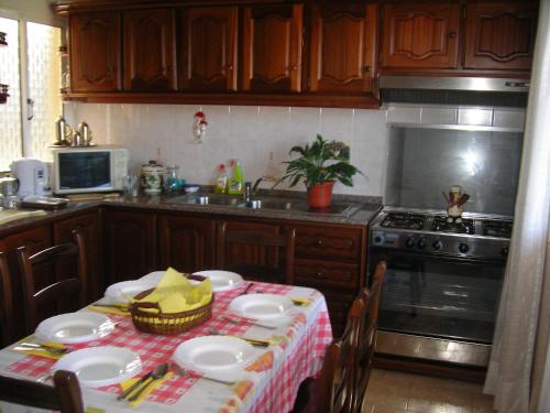 Dapur atau dapur kecil di Residencia ANA Piso Um 1