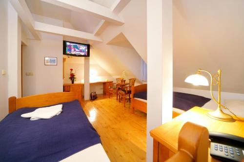 Postel nebo postele na pokoji v ubytování Hotel pizzeria Belmonte