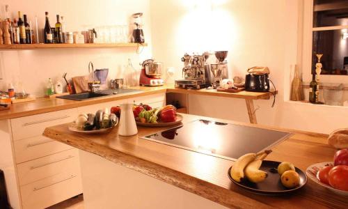 a kitchen with bananas and other fruits on a counter at Ca'Ceccarone in Cagli