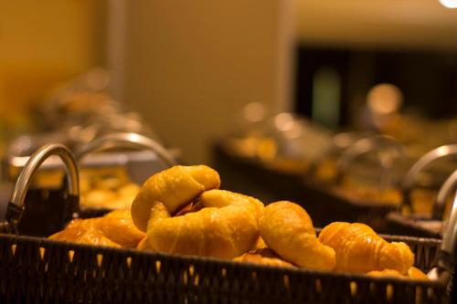 a bunch of food in a basket at Viale Tower Hotel in Foz do Iguaçu