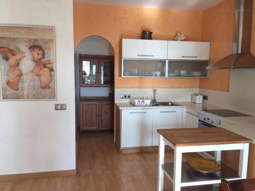 Kuchyňa alebo kuchynka v ubytovaní Apartamento Paradise Pueblo Sherry
